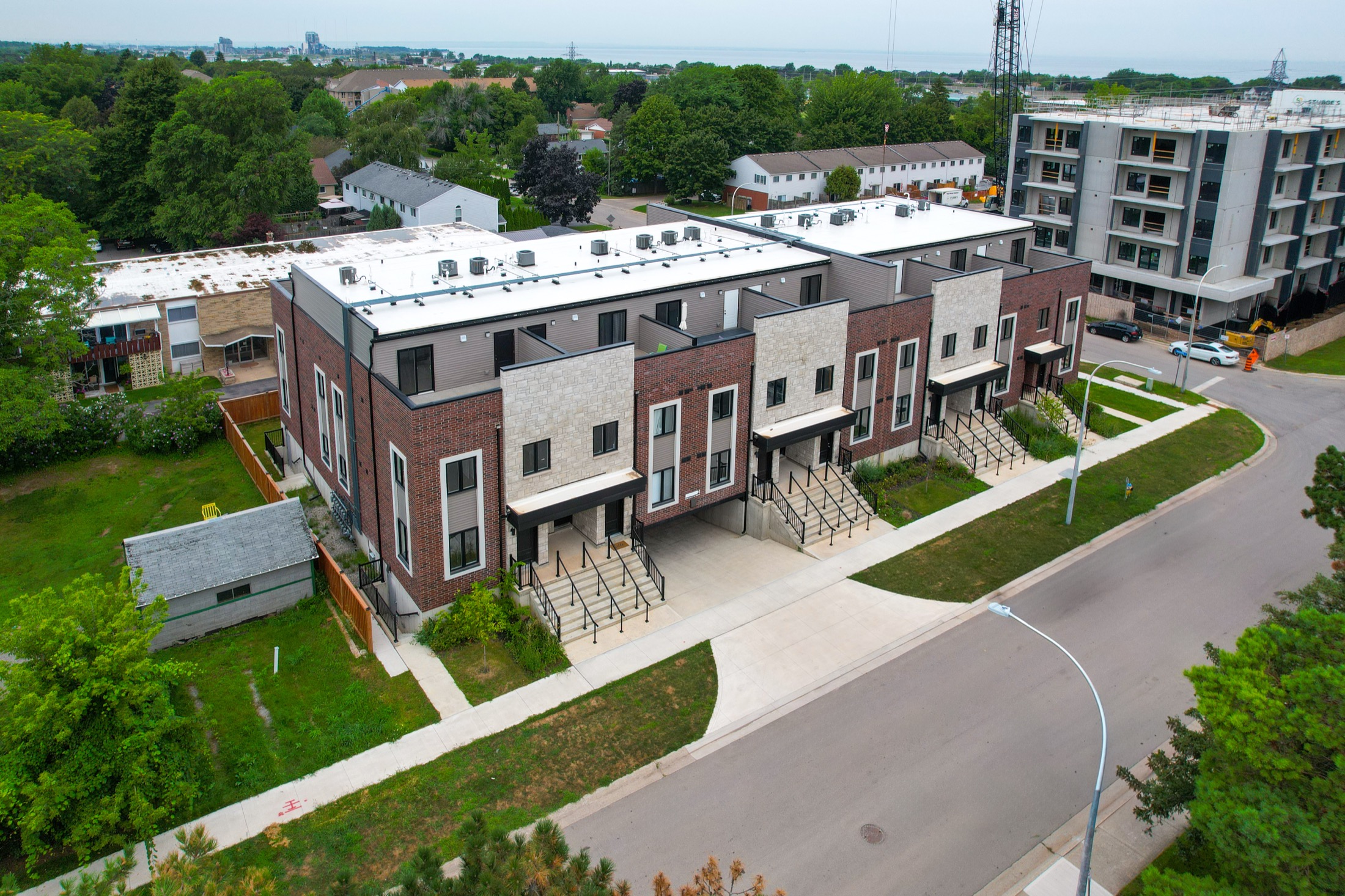 Aerial view of the Sky Terraces townhomes in downtown Grimsby with Lake Ontario beyond