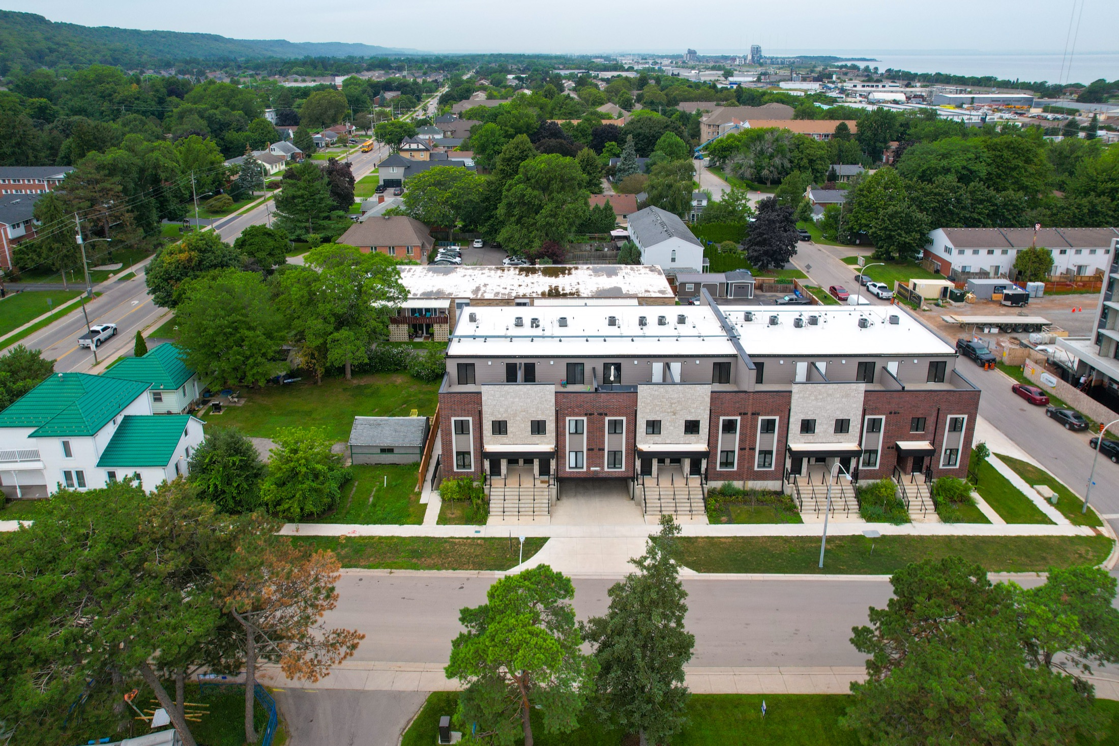 Aerial view over downtown Grimsby toward the shores of Lake Ontario
